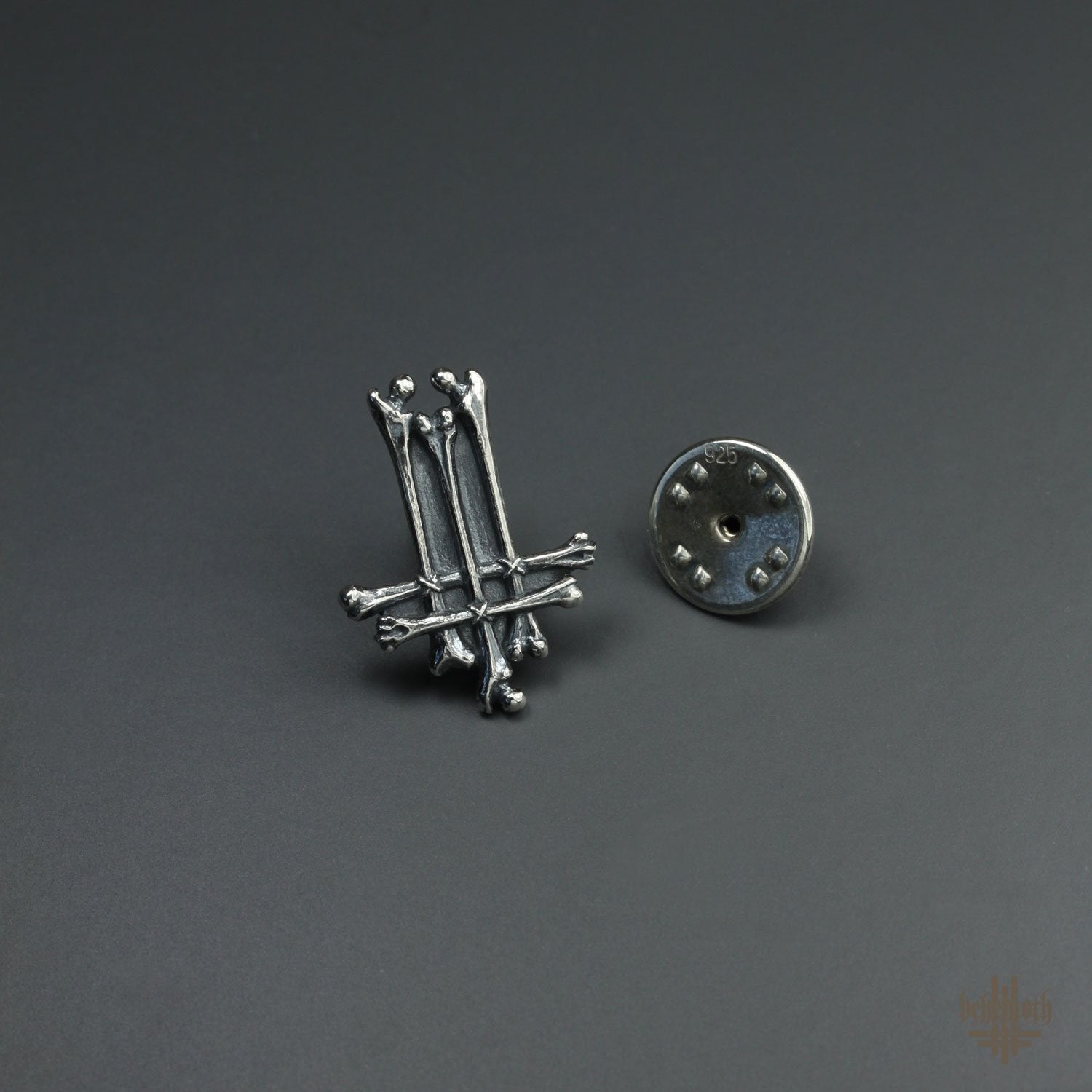 A Behemoth 'Trivmviratvs Bones' sterling silver pin